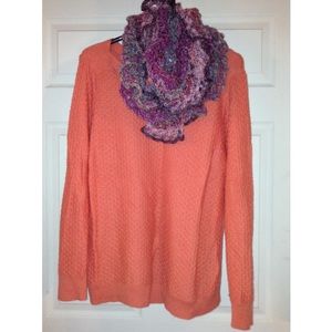 A crocheted multicolored scarf